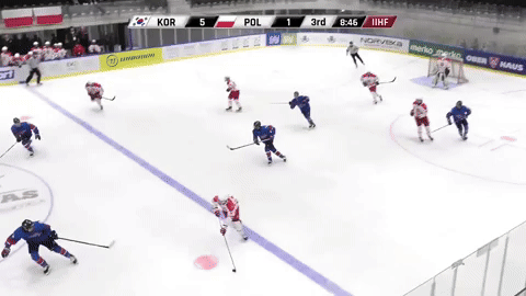 Janik spins while falling down managing to surprise the goalie with a shot